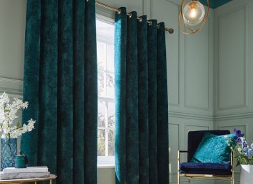 Dark green velvet drapes