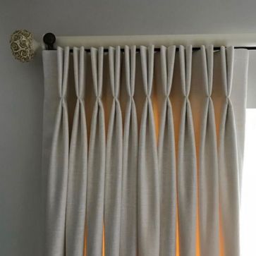 White pleat curtains